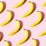Repeated banana on the pink background
