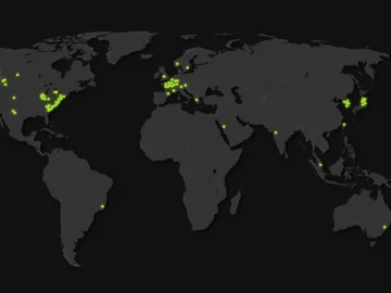 A rack of NVIDIA AI supercomputers with compute blades, representing advanced scientific research infrastructure.